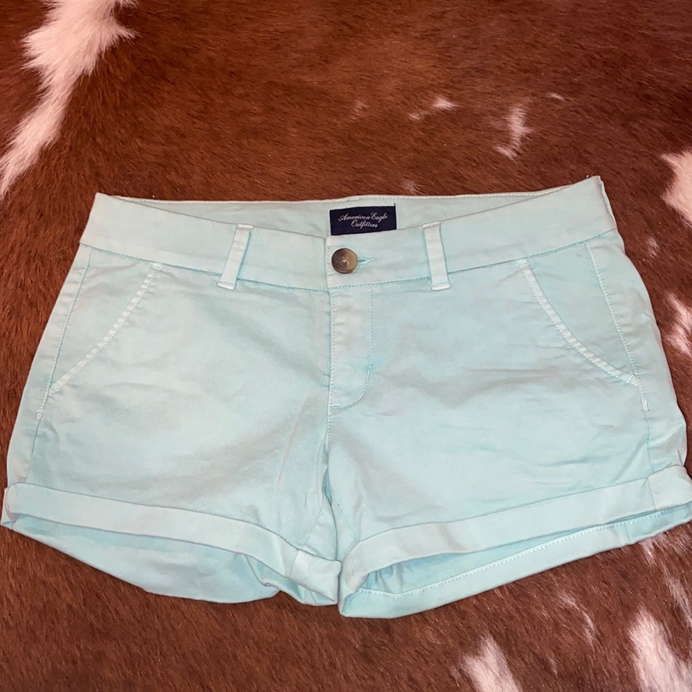 American eagle teal stretch shirts. Size 8.